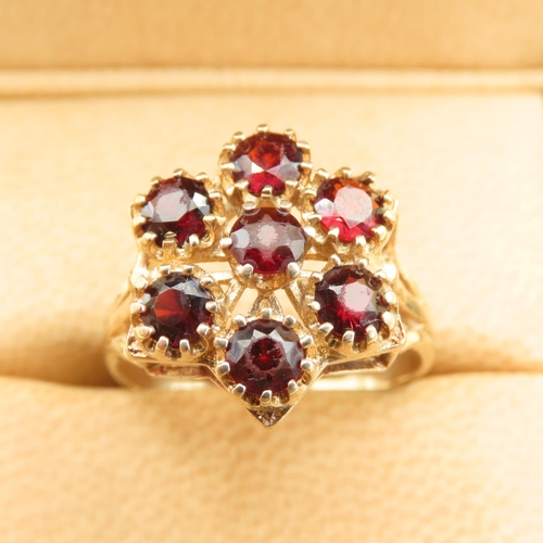 451 - Red Garnet Six Stone Cluster Ring Mounted on 9 Carat Yellow Gold Band Size Q