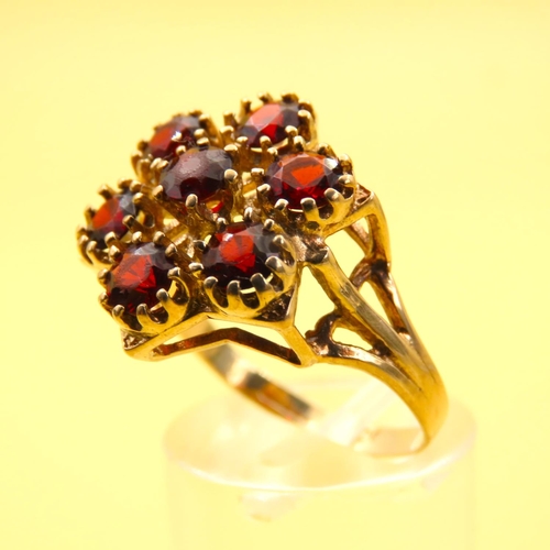 451 - Red Garnet Six Stone Cluster Ring Mounted on 9 Carat Yellow Gold Band Size Q