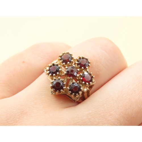 451 - Red Garnet Six Stone Cluster Ring Mounted on 9 Carat Yellow Gold Band Size Q