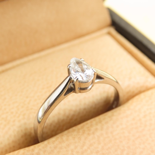 454 - Diamond Solitaire Ring Pear Cut Mounted on Platinum Set on Platinum Band Ring Size O