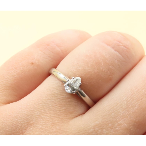 454 - Diamond Solitaire Ring Pear Cut Mounted on Platinum Set on Platinum Band Ring Size O