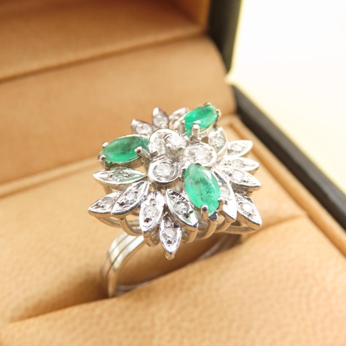 478 - Emerald and Diamond Floral Design Cluster Ring Mounted on 18 Carat White Gold Attractively Detailed ... 