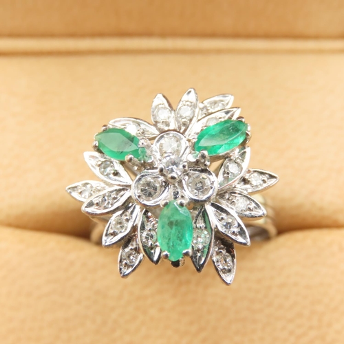 478 - Emerald and Diamond Floral Design Cluster Ring Mounted on 18 Carat White Gold Attractively Detailed ... 