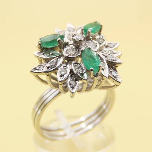 478 - Emerald and Diamond Floral Design Cluster Ring Mounted on 18 Carat White Gold Attractively Detailed ... 