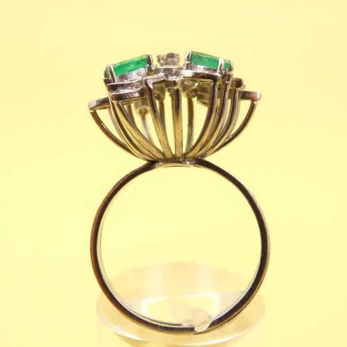 478 - Emerald and Diamond Floral Design Cluster Ring Mounted on 18 Carat White Gold Attractively Detailed ... 