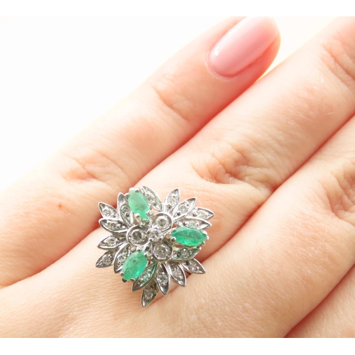 478 - Emerald and Diamond Floral Design Cluster Ring Mounted on 18 Carat White Gold Attractively Detailed ... 