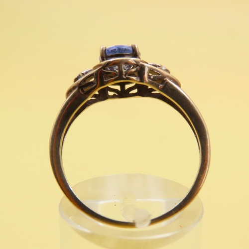 483 - Tanzanite and Diamond Ring Mounted on 9 Carat Yellow Gold Band Size Q