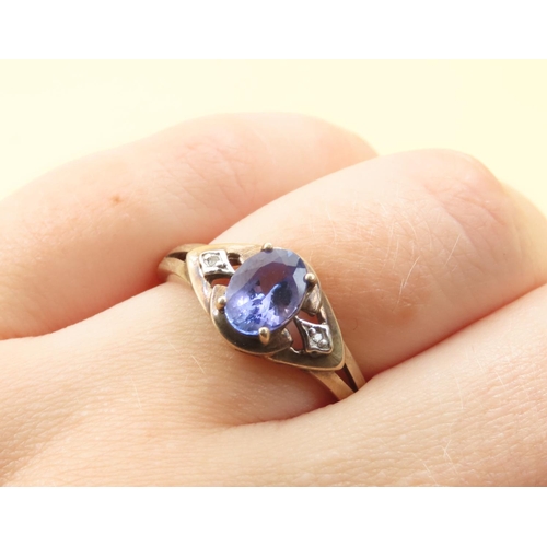 483 - Tanzanite and Diamond Ring Mounted on 9 Carat Yellow Gold Band Size Q