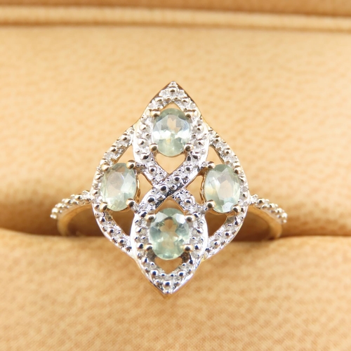 489 - Aquamarine and Diamond Ring Mounted on 10 Carat Yellow Gold Attractively Detailed Band Size Q