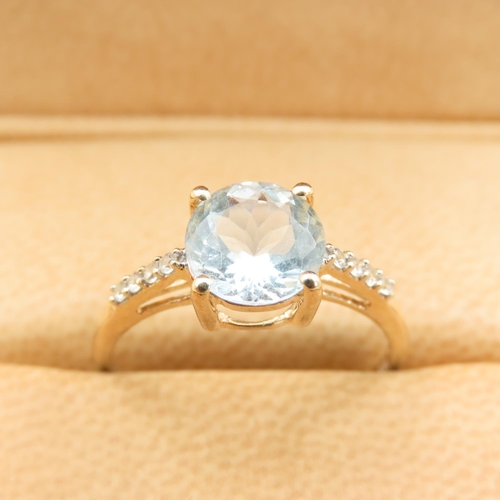 490 - Round Cut Aquamarine Center Stone Ring with Further Diamonds Set to Shoulders Mounted on 10 Carat Ye... 