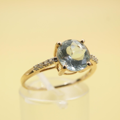 490 - Round Cut Aquamarine Center Stone Ring with Further Diamonds Set to Shoulders Mounted on 10 Carat Ye... 