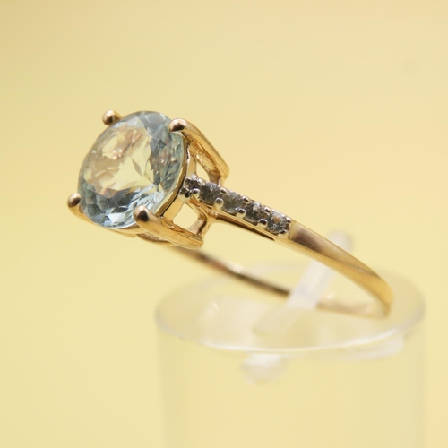 490 - Round Cut Aquamarine Center Stone Ring with Further Diamonds Set to Shoulders Mounted on 10 Carat Ye... 