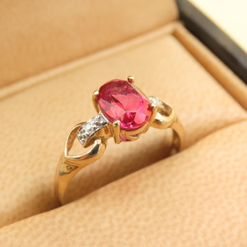 495 - Red Spinel and Diamond Set Ring Mounted on 9 Carat Yellow Gold Band Size P