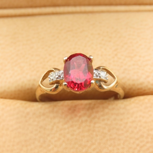 495 - Red Spinel and Diamond Set Ring Mounted on 9 Carat Yellow Gold Band Size P