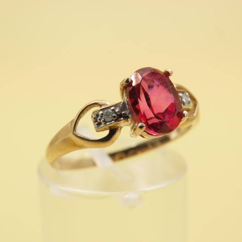 495 - Red Spinel and Diamond Set Ring Mounted on 9 Carat Yellow Gold Band Size P