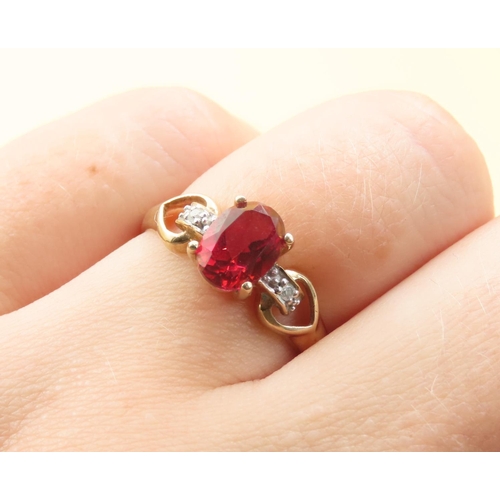 495 - Red Spinel and Diamond Set Ring Mounted on 9 Carat Yellow Gold Band Size P