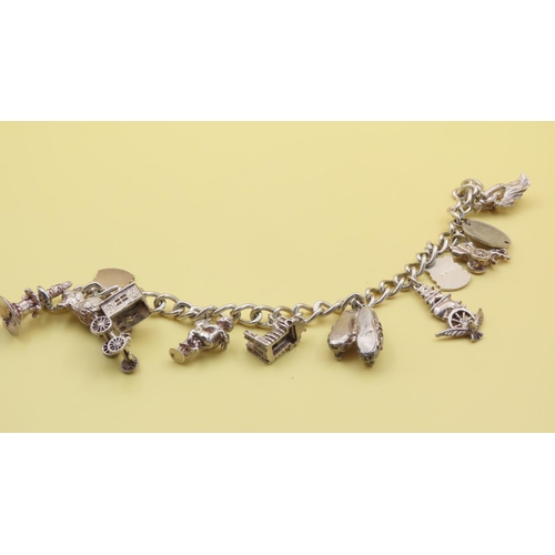 510 - Silver Charm Bracelet 18cm Long