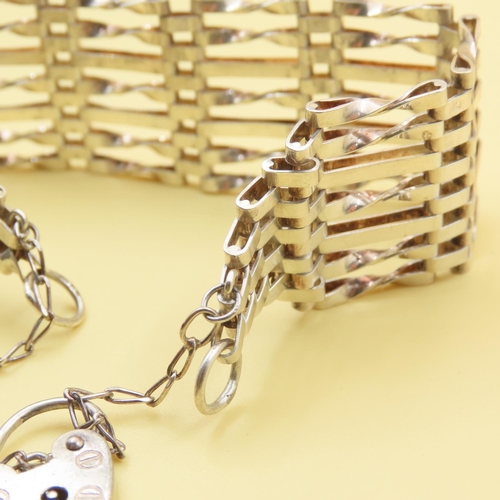 514 - Seven Bar Gate Link Bracelet with Love Motif Padlock and Safety Chain