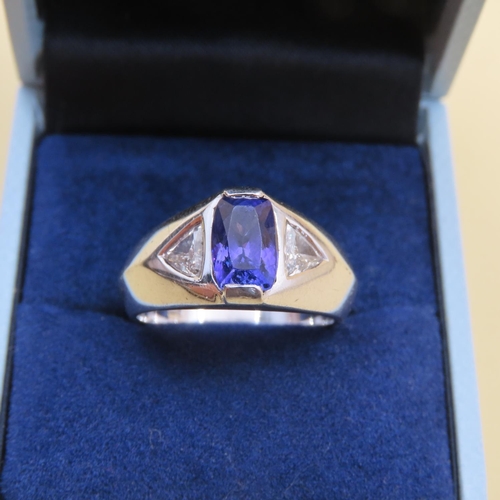 517 - Tanzanite Center Stone Ring with Further Diamonds Set to Shoulders Mounted on 18 Carat White Gold Ba... 