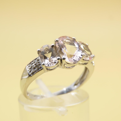 540 - Three Stone Morganite Set Ring Mounted on 9 Carat White Gold with Further Diamonds Set to Shoulders ... 