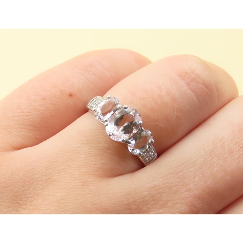 540 - Three Stone Morganite Set Ring Mounted on 9 Carat White Gold with Further Diamonds Set to Shoulders ... 