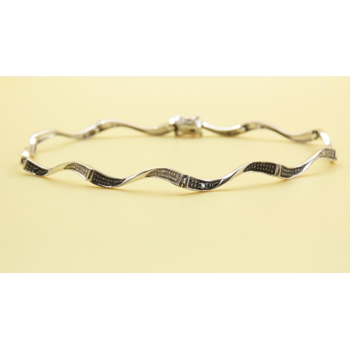 542 - Designer Wave Design Diamond Set Bracelet Mounted in 9 Carat White Gold 19cm Long