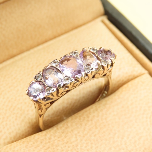 547 - Five Stone Amethyst and Diamond Ring Mounted on 9 Carat Yellow Gold Attractively Detailed Band Size ... 