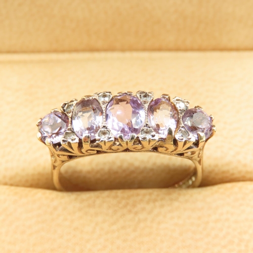 547 - Five Stone Amethyst and Diamond Ring Mounted on 9 Carat Yellow Gold Attractively Detailed Band Size ... 