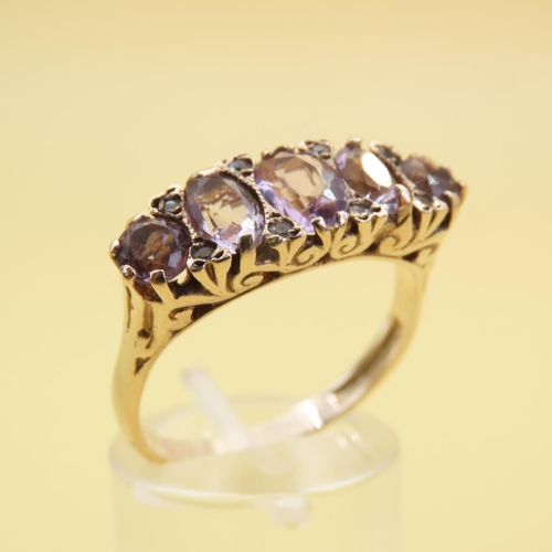 547 - Five Stone Amethyst and Diamond Ring Mounted on 9 Carat Yellow Gold Attractively Detailed Band Size ... 