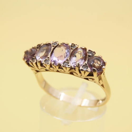 547 - Five Stone Amethyst and Diamond Ring Mounted on 9 Carat Yellow Gold Attractively Detailed Band Size ... 