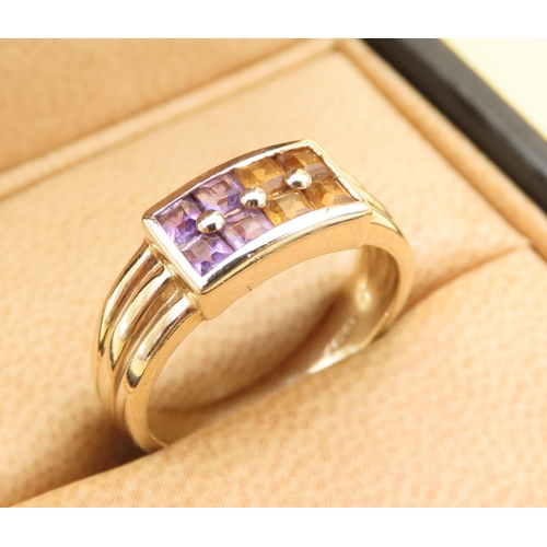 548 - Eight Stone Amethyst and Citrine Split Design Ring Mounted on 9 Carat Yellow Gold Band Size P