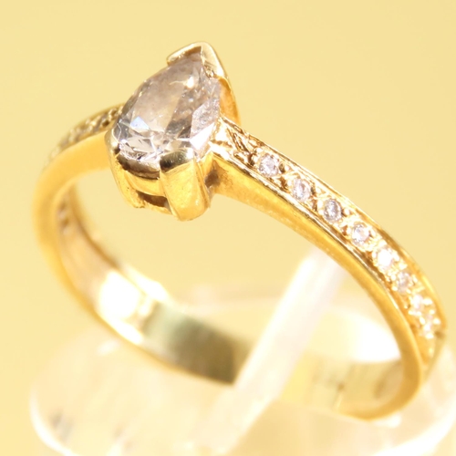 55 - Pear Cut Diamond Solitaire Ring Mounted on a 18 Carat Yellow Gold Band Further Diamond Inset on Shou... 