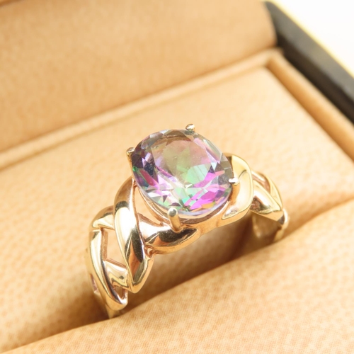 551 - Mystic Topaz Center Stone Crossover Design Ring Mounted on 9 Carat Yellow Gold Band Size M and a Hal... 