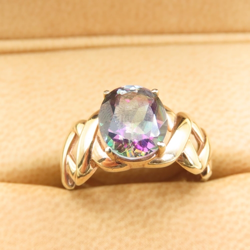 551 - Mystic Topaz Center Stone Crossover Design Ring Mounted on 9 Carat Yellow Gold Band Size M and a Hal... 