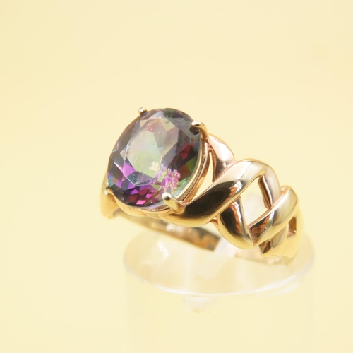 551 - Mystic Topaz Center Stone Crossover Design Ring Mounted on 9 Carat Yellow Gold Band Size M and a Hal... 