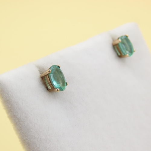 552 - Pair of Emerald Set Stud Earrings Mounted on 9 Carat Yellow Gold