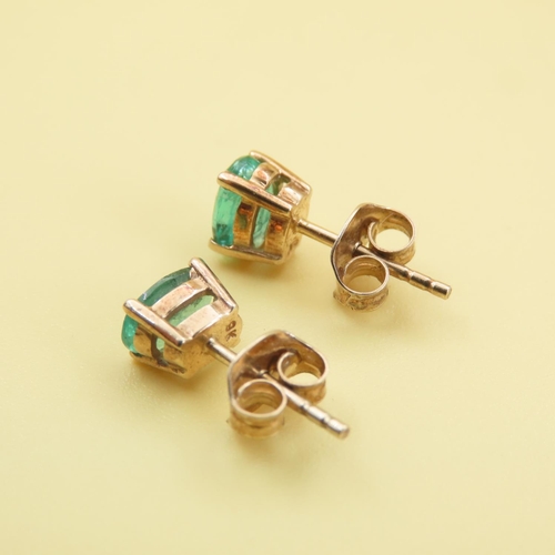 552 - Pair of Emerald Set Stud Earrings Mounted on 9 Carat Yellow Gold