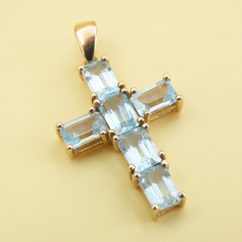 553 - Six Stone Aquamarine Cross Pendant Set in 9 Carat Yellow Gold 3cm Drop