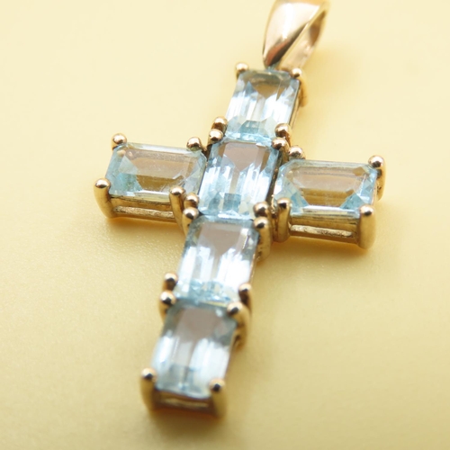 553 - Six Stone Aquamarine Cross Pendant Set in 9 Carat Yellow Gold 3cm Drop