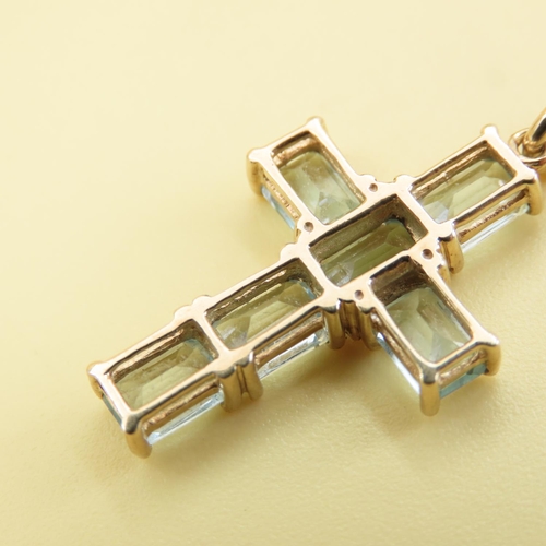 553 - Six Stone Aquamarine Cross Pendant Set in 9 Carat Yellow Gold 3cm Drop