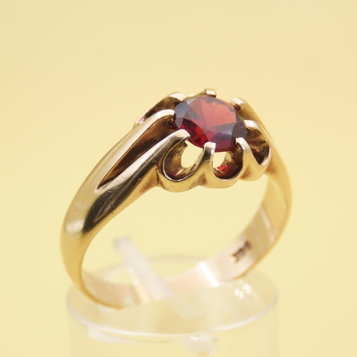 558 - Red Garnet Center Stone Ring Mounted on 9 Carat Yellow Gold Band Size T