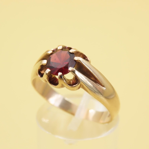 558 - Red Garnet Center Stone Ring Mounted on 9 Carat Yellow Gold Band Size T