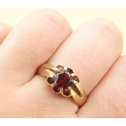 558 - Red Garnet Center Stone Ring Mounted on 9 Carat Yellow Gold Band Size T