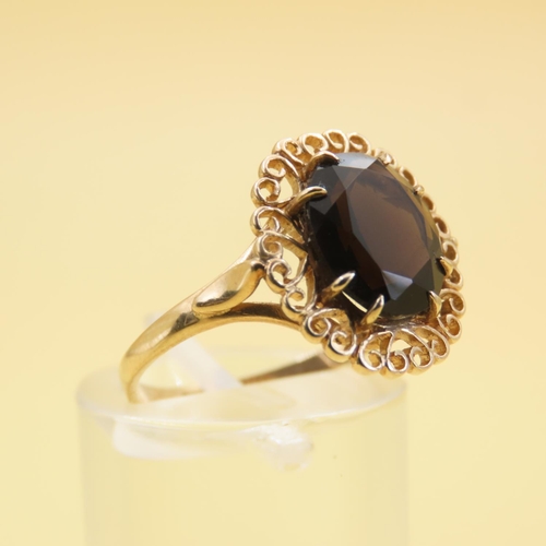 559 - Smoky Quartz Ring Mounted on 9 Carat Yellow Gold Attractively Detailed Band Size N