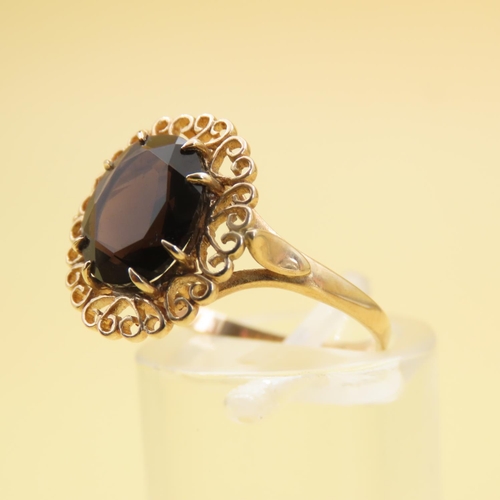 559 - Smoky Quartz Ring Mounted on 9 Carat Yellow Gold Attractively Detailed Band Size N