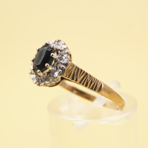 566 - Sapphire and Diamond Cluster Ring Mounted on 9 Carat Yellow Gold Band Size R and a Half