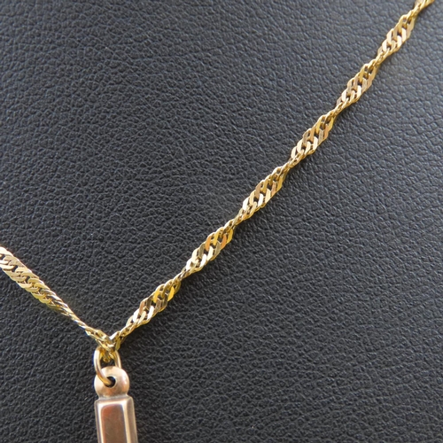 572 - 9 Carat Yellow Gold Cross Pendant 4cm Drop Further Set on a 9 Carat Yellow Gold Chain 50cm Long