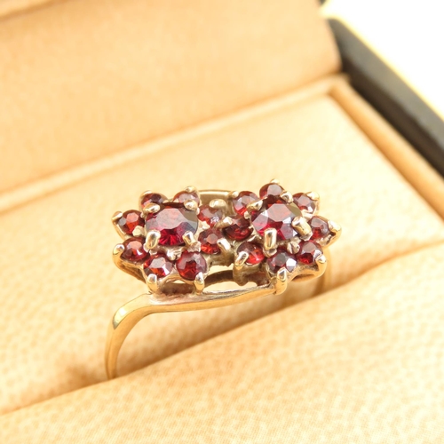 574 - Red Garnet Flower Motif Cluster Ring Mounted on 9 Carat Yellow Gold Band Size R and a Half