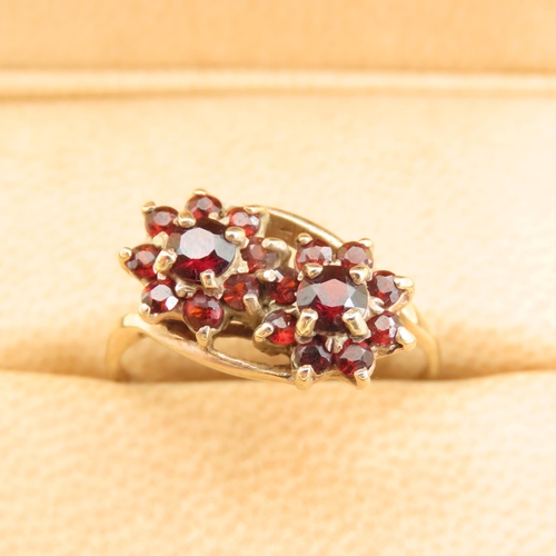 574 - Red Garnet Flower Motif Cluster Ring Mounted on 9 Carat Yellow Gold Band Size R and a Half