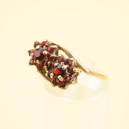 574 - Red Garnet Flower Motif Cluster Ring Mounted on 9 Carat Yellow Gold Band Size R and a Half